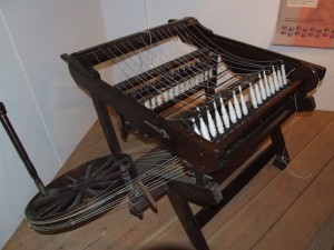 16 spindle version of James Hargreave's spinning jenny, as patented in 1770. Helmshore Mills Textile Museum.